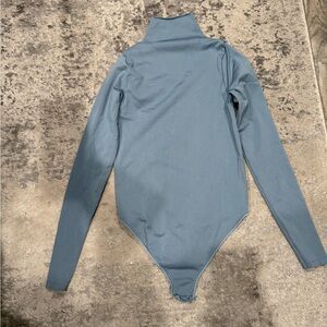 Skims long sleeve body suit S/M